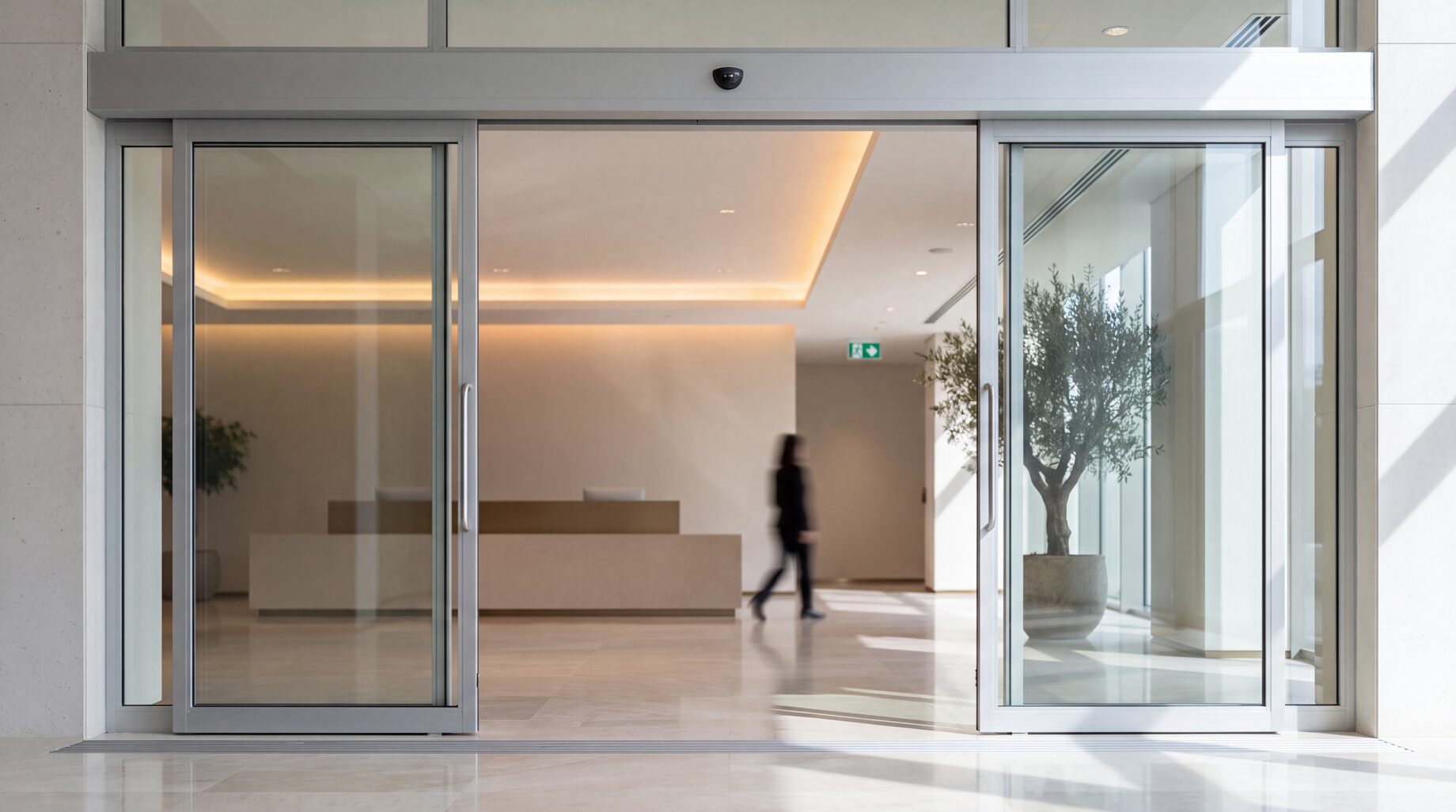 ES200 automatic sliding door at a building entrance